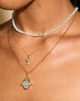 10 Karat Yellow Gold Oval Milky Aquamarine Spinning Pendant with Star Overlay - Peridot Fine Jewelry - Zahava
