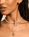 10K Oval Rutilated Quartz Spinning Pendant with Star Overlay - Peridot Fine Jewelry - Zahava