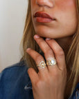 14K Wide Tapered Shield Ring with Center Pear - Shaped Moonstone & Diamond Details - Peridot Fine Jewelry - Celine Daoust