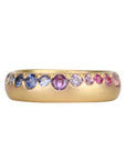 18K Gold Rounded Band with a Row of Varying - Sized Ombre Pink, Purple & Blue Sapphires - Peridot Fine Jewelry - Annie Fensterstock