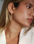 20K Gold Mini Pear-Shaped "Doorknocker" Earrings on Sculptural Ear Wires - Peridot Fine Jewelry - Caroline Ellen