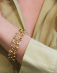 22K Gold "Double Swirl" Wire Bracelet with Aquamarines and Pink Tourmalines - Peridot Fine Jewelry - Petra Class