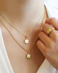 20K Gold Six-Pointed Star Pendant with Star-Set Diamond Center