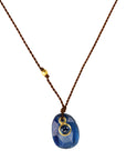 Faceted Oval Kyanite Pendant Necklace with 18K Bezel - Set Cabochon Blue Sapphire Detail on Brown Cord - Peridot Fine Jewelry - Margaret Solow Jewelry