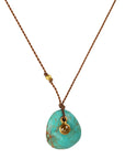 Smooth Asymmetrical Turquoise Pendant Necklace with 18K Bezel Set Cognac Diamond Detail on Brown Cord - Peridot Fine Jewelry - Margaret Solow Jewelry