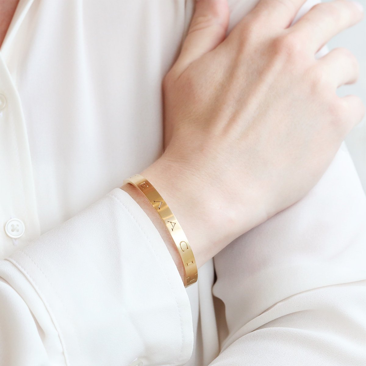 Caroline Ellen 18K Gold Hinged Engraved "May You Have Luck and Laughter" Bangle Bracelet