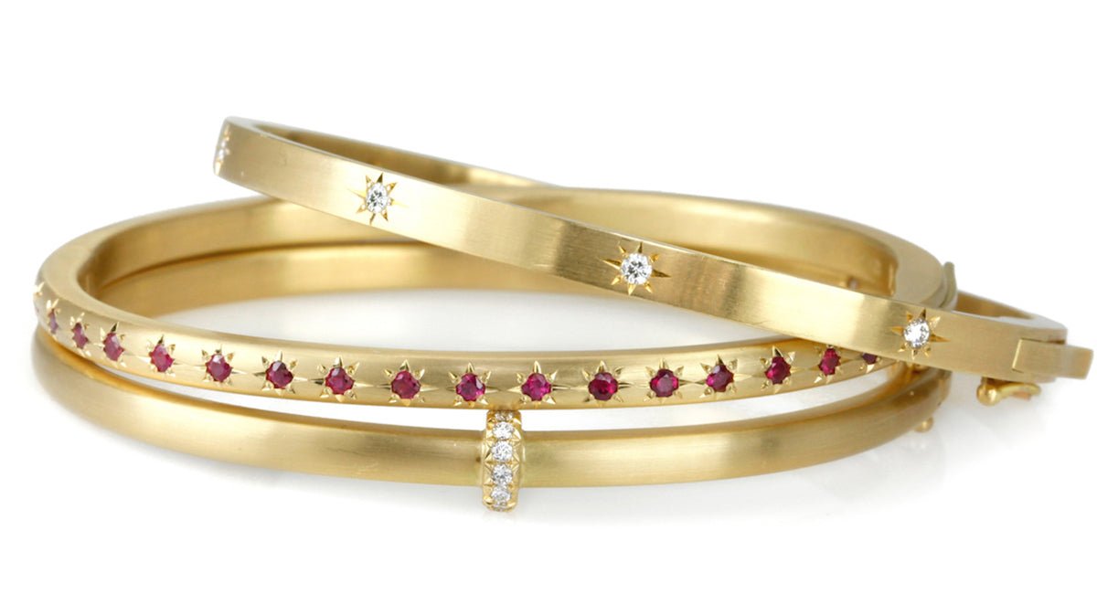 Caroline Ellen Gold Narrow Rounded Hinged Bangle with Star-Set Burmese Rubies