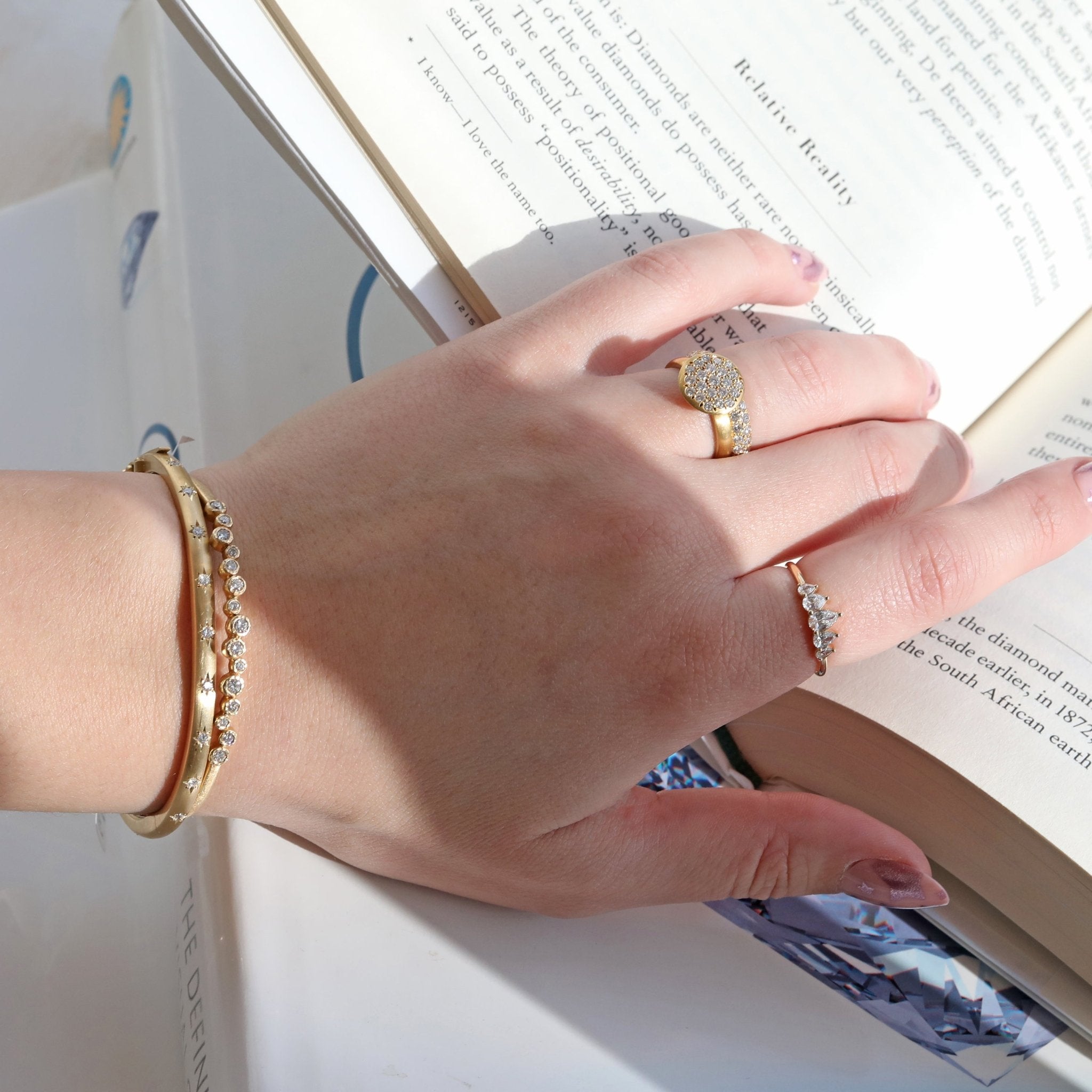 Caroline Ellen 18K Gold Oval Hinged Bangle with 18 Star-Set Diamonds