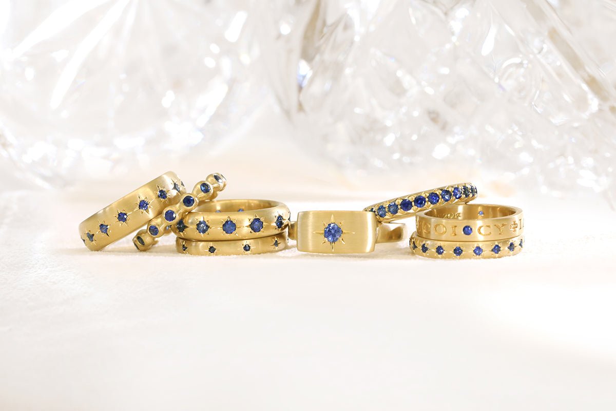 20K Gold Bezel-Set Blue Sapphire Eternity "Ball" Ring