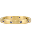 Caroline Ellen 20K Gold Narrow Slightly Rounded Ring with 10 Star-Set Blue Sapphires