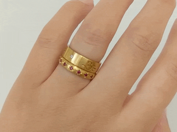 Caroline Ellen 20K Gold Semi-Rounded Ring with 18 Star-Set Burmese Rubies