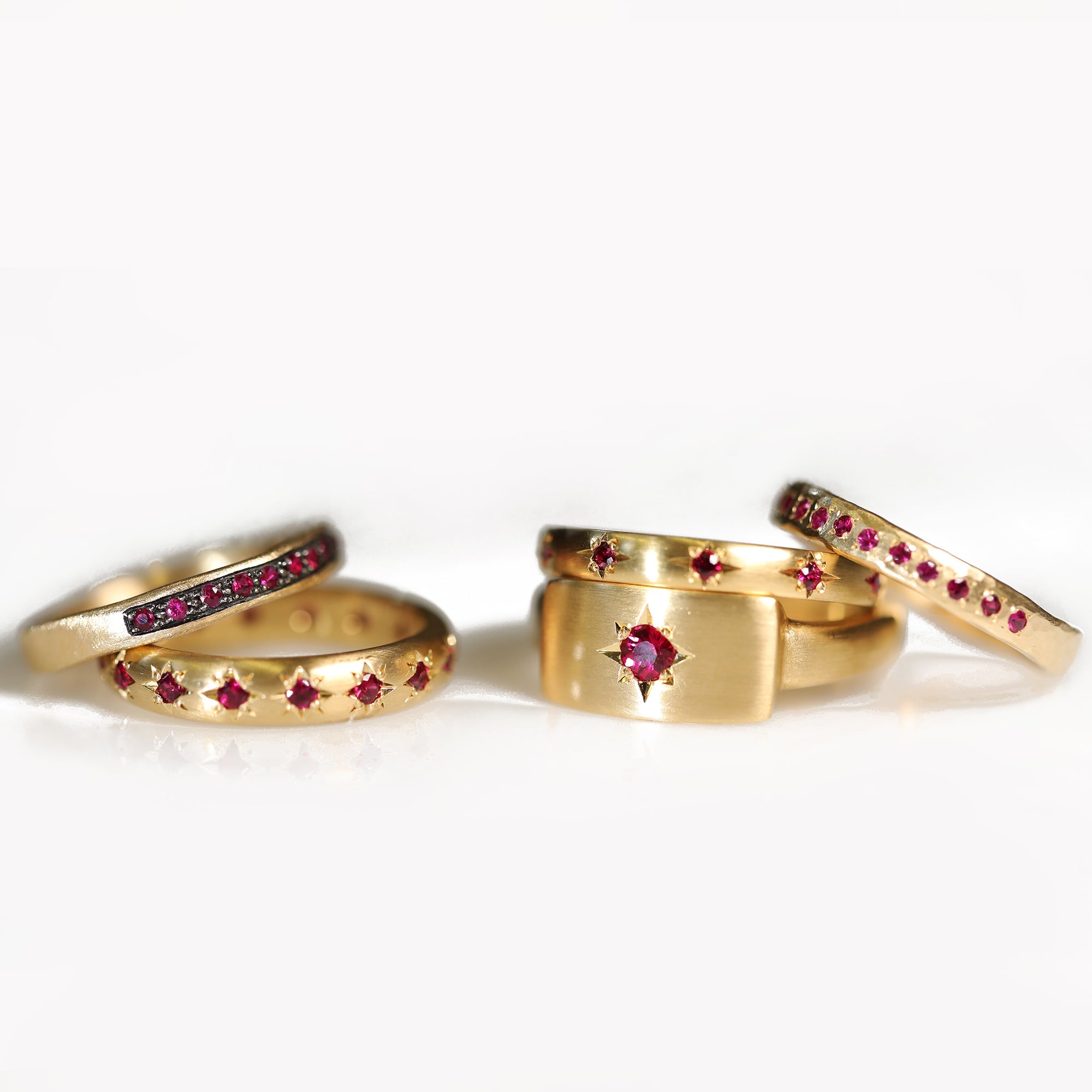 Caroline Ellen 20K Gold Semi-Rounded Ring with 18 Star-Set Burmese Rubies