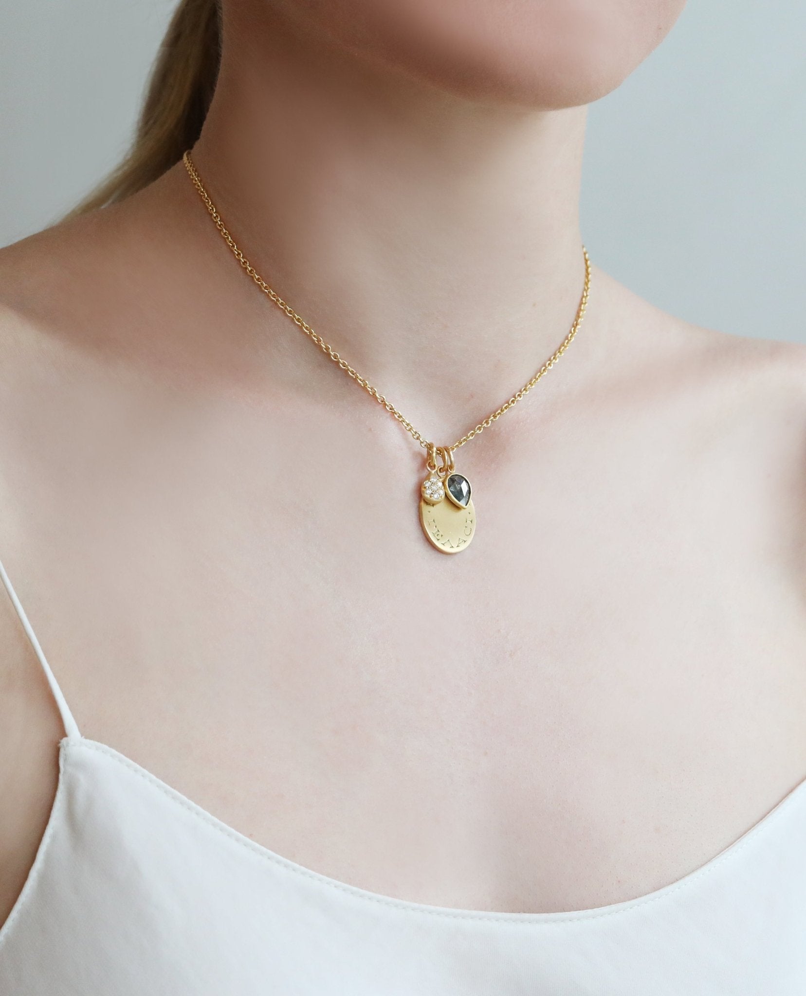 22K Gold Pearshape Black Diamond Pendant