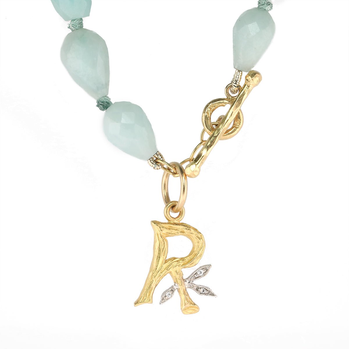 22K Gold Textured "R" Pendant With Platinum And Diamond Leaf Detail