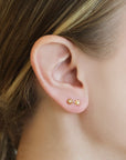 Renata Collection Gold "Star" Stud Earrings with Bezel-Set Diamond Center