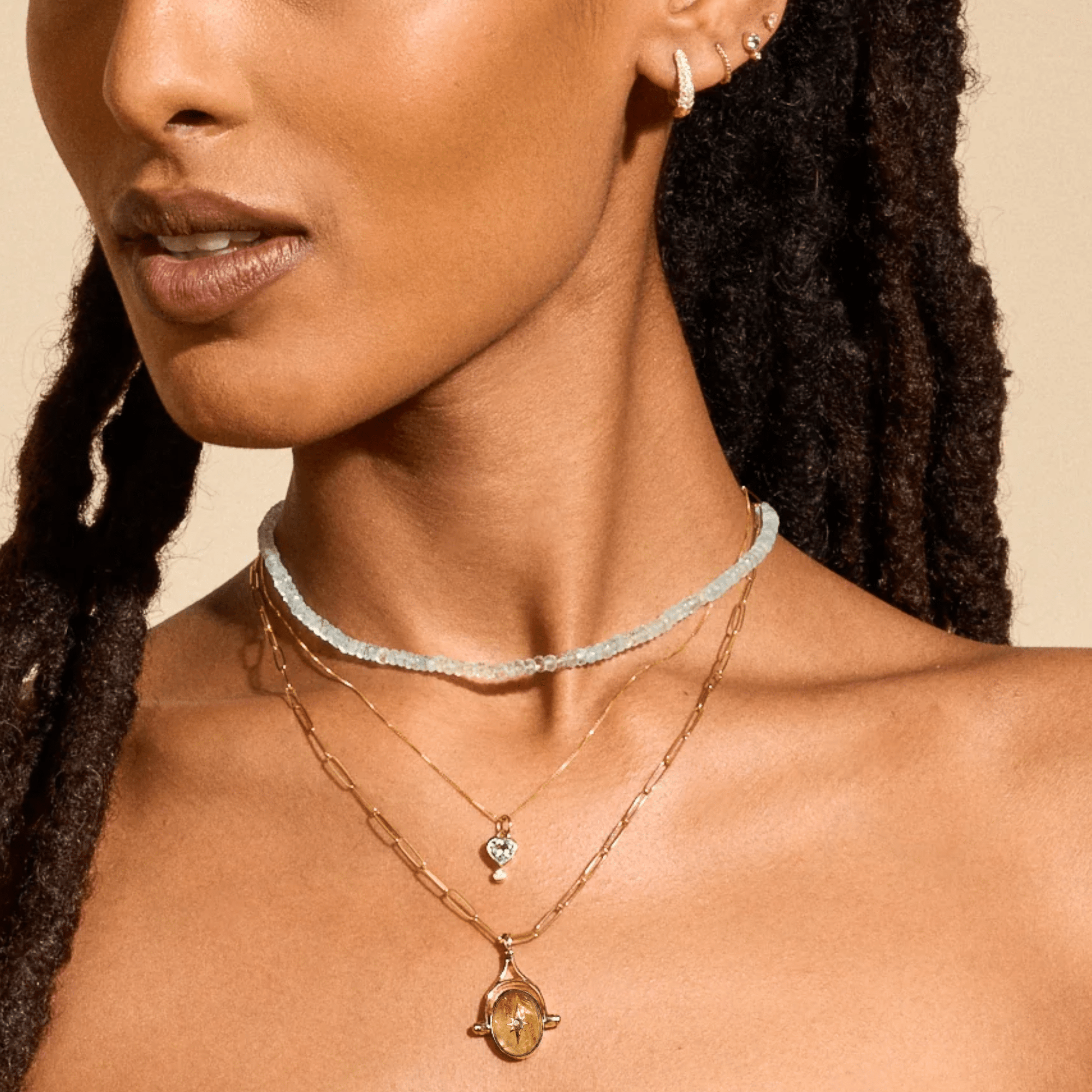10K Oval Rutilated Quartz Spinning Pendant with Star Overlay - Peridot Fine Jewelry - Zahava