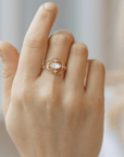 14K and Marquise Moonstone "Eye" Cut-Out Ring with Princess Cut Diamonds & Pave Crescent Details - Peridot Fine Jewelry - Celine Daoust