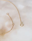 14K "Rising Sun" Necklace with Curved Baguette Diamond Row - Peridot Fine Jewelry - Celine Daoust