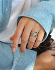 18K Gold East - West Emerald - Cut Blue Sapphire with Diamond Shoulder Details - Peridot Fine Jewelry - Yasuko Azuma