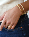 18K Gold Oval Hinged Bangle Bracelet with Single Row of Pave Diamonds - Peridot Fine Jewelry - Caroline Ellen