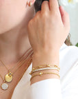 18K Gold Oval Hinged Bangle Bracelet with Single Row of Pave Diamonds - size MEDIUM - Peridot Fine Jewelry - Caroline Ellen
