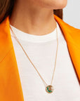 18K "Roda 15" Necklace with Circular "Shake" Pendant with Loose Baguette Emeralds - Peridot Fine Jewelry - Moritz Glik