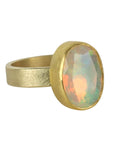 22K & 18K Bezel-Set North/South Oval Faceted Ethiopian Opal Ring - Peridot Fine Jewelry - Petra Class