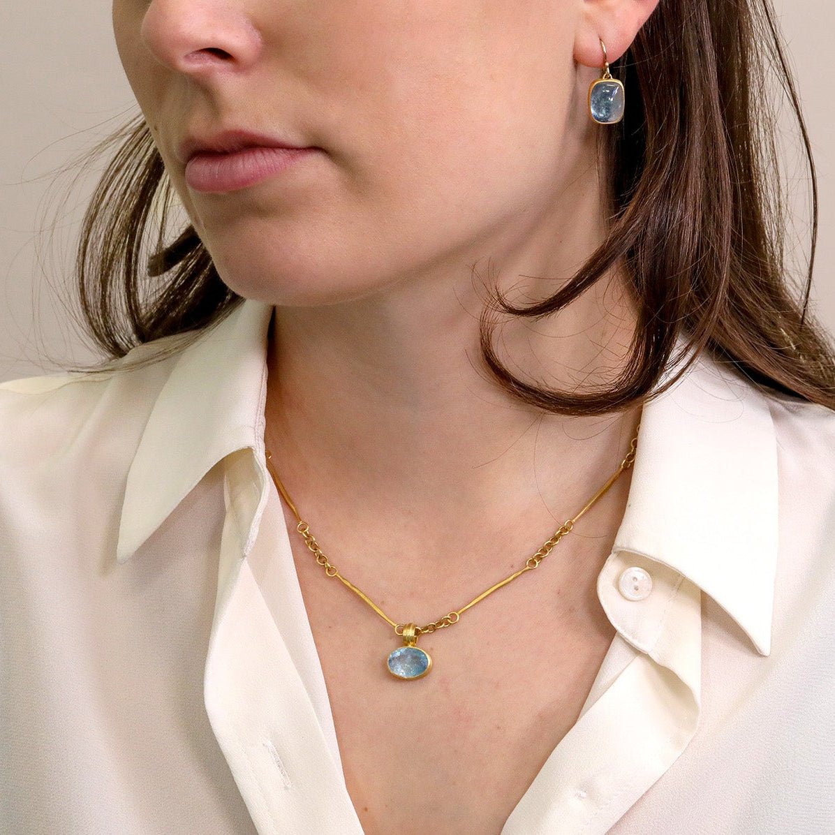 22K Wide Tapered Domed Ring with East/West Faceted Blue Tourmaline - Peridot Fine Jewelry - Rosanne Pugliese