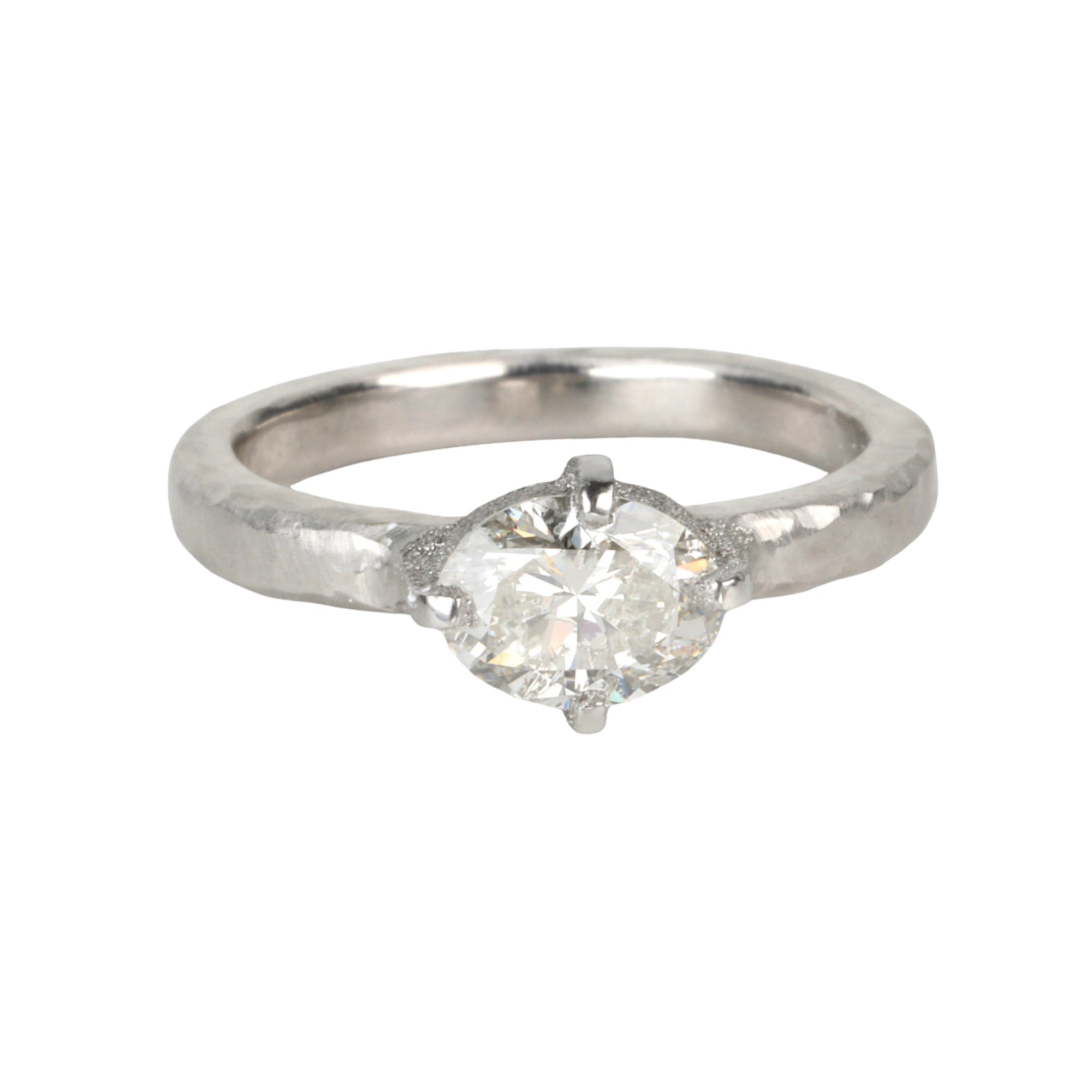 Platinum Prong-Set Horizontal Oval Diamond Ring with Hammered Texture