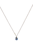 Faceted Oval Kyanite Pendant Necklace with 18K Bezel - Set Cabochon Blue Sapphire Detail on Brown Cord - Peridot Fine Jewelry - Margaret Solow Jewelry