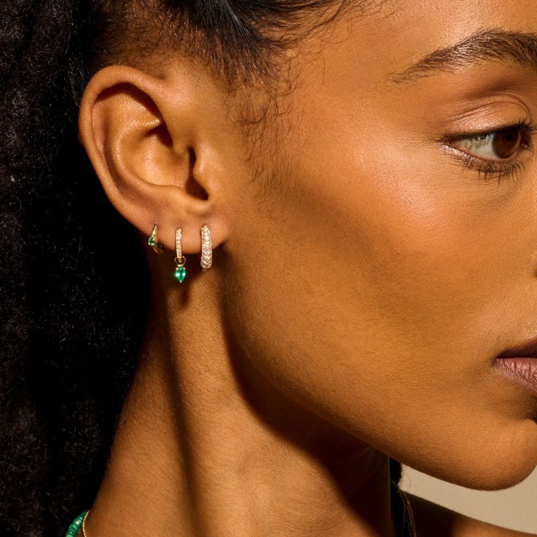 &quot;Romy&quot; Huggie Click Hoop Earring with Bezel - Set Emerald - Peridot Fine Jewelry - Zahava
