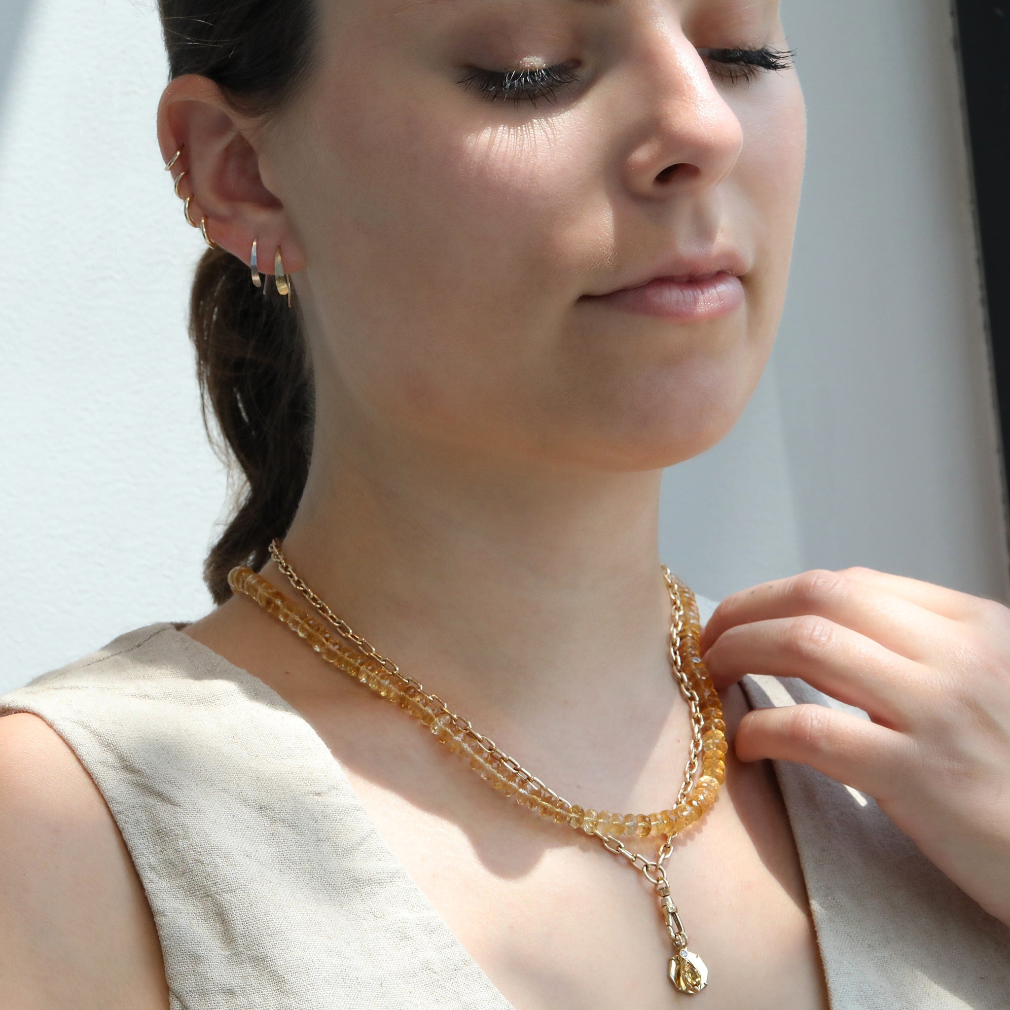 14 Karat Yellow Gold Extra Small Wishbone Hoop Earrings - Peridot Fine Jewelry - Melissa Joy Manning
