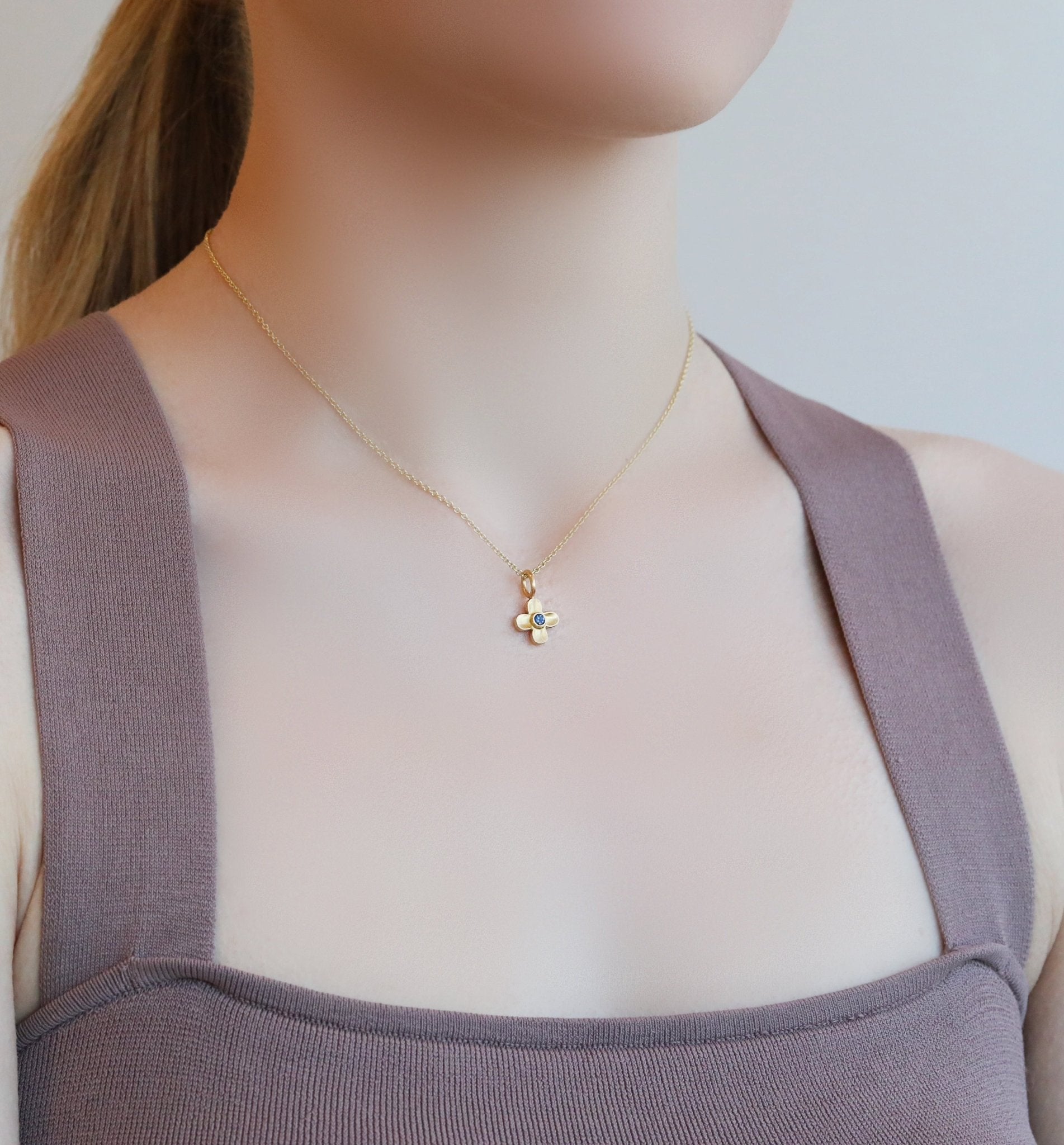 Caroline Ellen 20K Gold Four-Petal Flower Pendant with Blue Sapphire Center